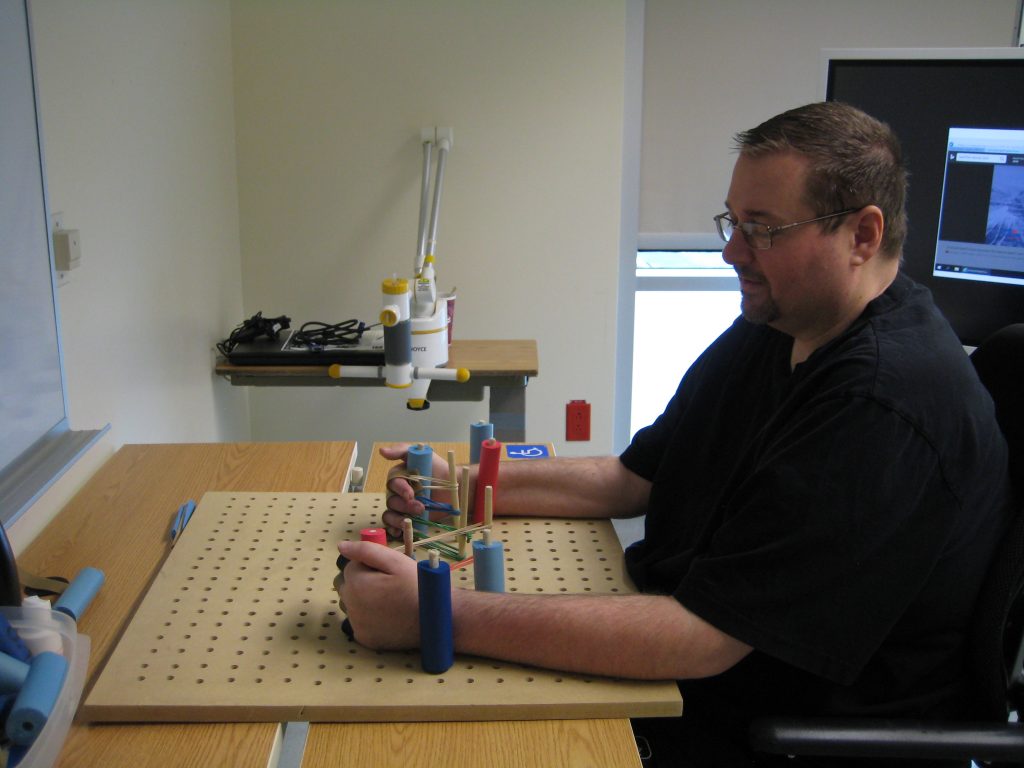 Hand & Finger Stretch Board Exercises Occupational Therapy - Jamie Guillain Barre Syndrome Recovery at The Stan Cassidy Rehabilitation Centre in Fredericton- GBS