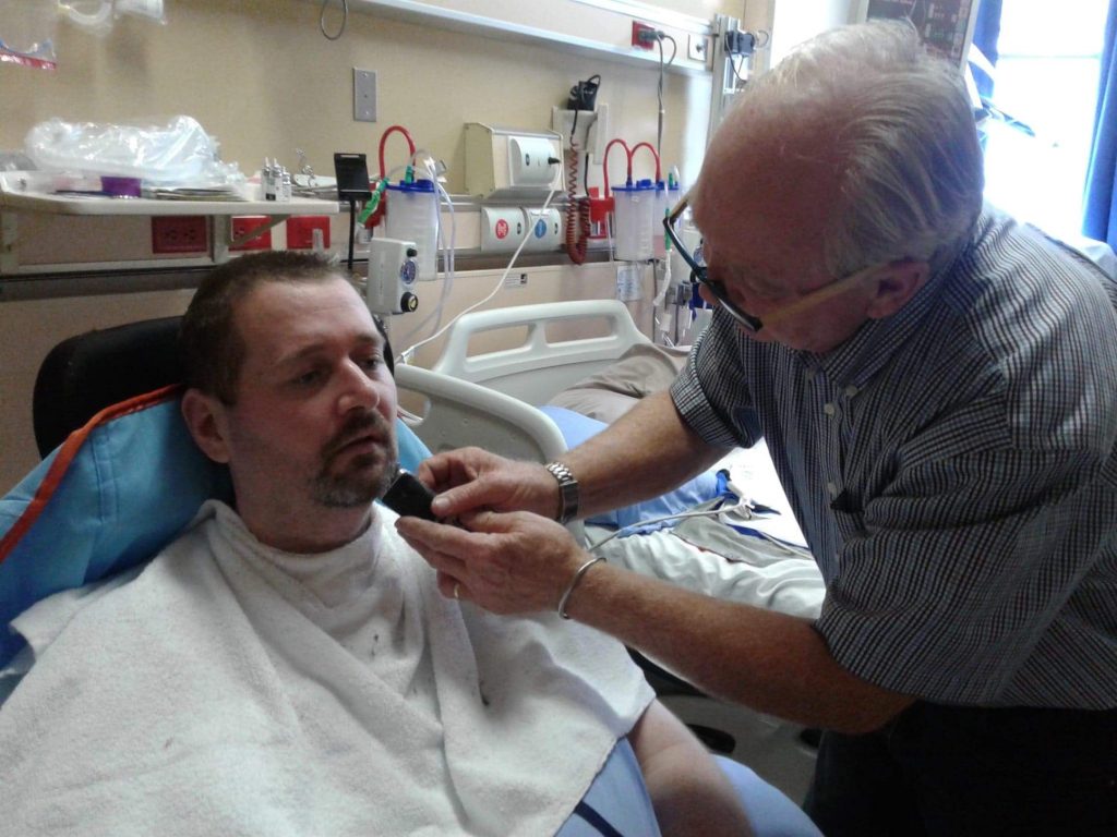 My dad giving me a shave at the Dr. Georges Dumont Hospital ICU in Moncton.