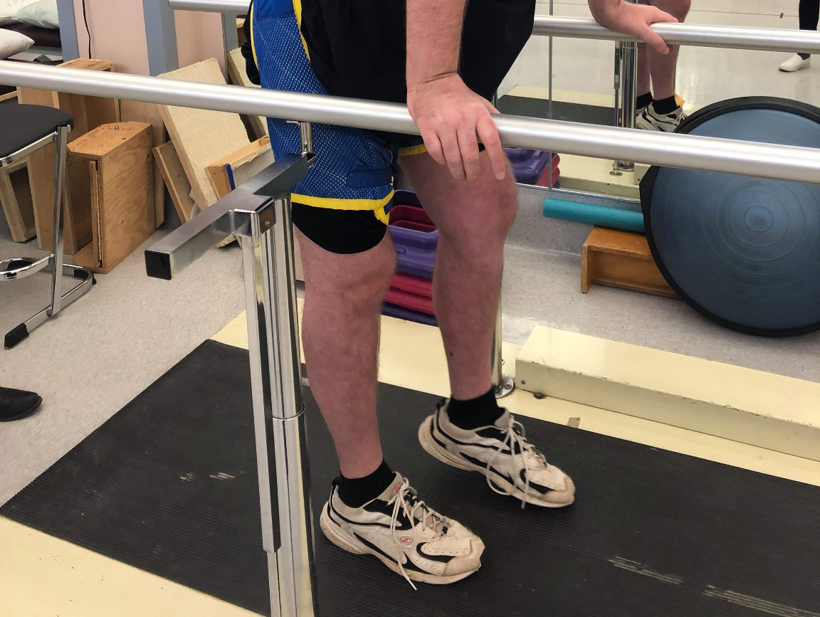 Jamie Boyle Walking Between Parallel Bars Improving - Guillain Barre Syndrome GBS Recovery